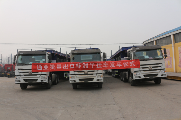 通亞汽車批量倉(cāng)柵半掛車遠(yuǎn)赴大洋彼岸助力非洲建設(shè)